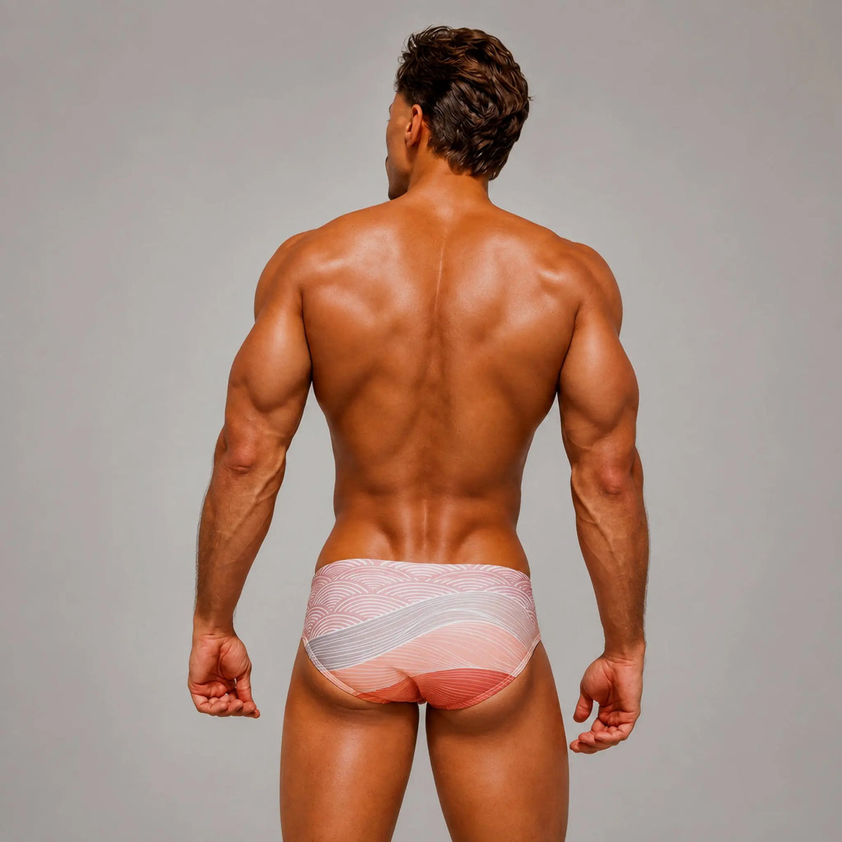 Brief Wave Coral hombre, vista trasera con diseño ondulado – EQUAL Swimwear